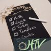 The store image for Chalkboard - it shows a a close up of a shopping list pressed on a bag